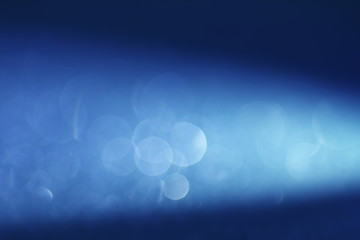 Abstract elegant blue bokeh lighting for christmas or holiday background
