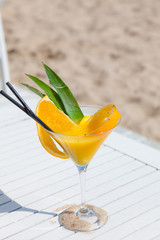 Exotic summer drink sandy on beach