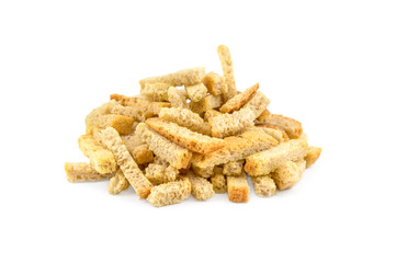 Heap of bread croutons to beer on a white background. Top view.