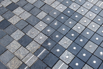 Metal marks in the street for blind persons