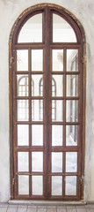 A long glasses and wooden door