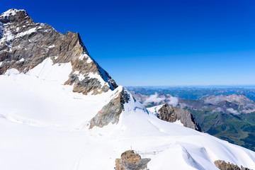 Fototapeta na wymiar Jungfrau mountain - View of the mountain Jungfrau in the Bernese Alps in Switzerland - travel destination in Europe
