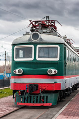 Fototapeta na wymiar Electric locomotive on the station platform