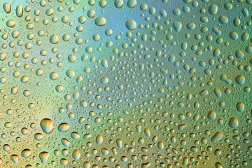 Closeup of water drops on glass surface