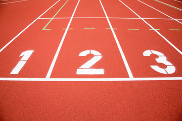 Running track numbers one two  three in stadium