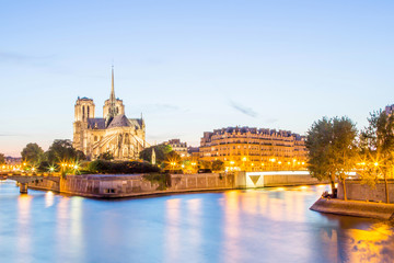 Notre Dame Cathedral with Paris cityscape panorama at dusk, Franc