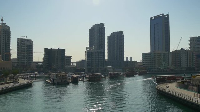 sunny day dubai marina yacht dock canal bridge panorama 4k uae

