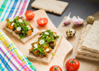 Healthy food. Appetizer. Crispbread with steamed vegetables (eggplant, carrot, onion)