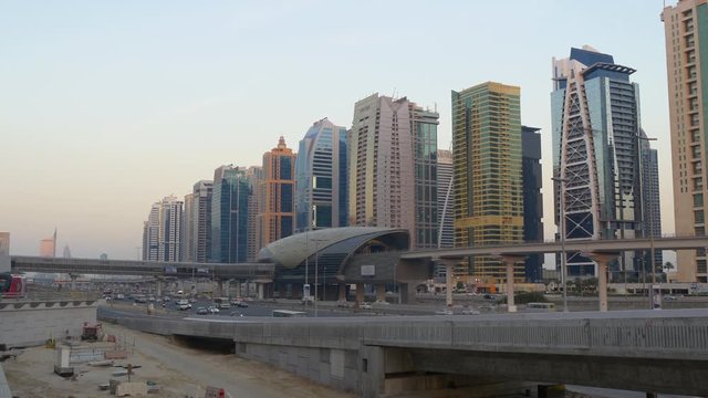 dubai sunset jlt sheikh zayed traffic road metro line panorama 4k uae

