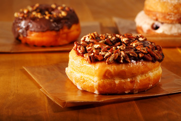 Donuts on a rustic wooden background