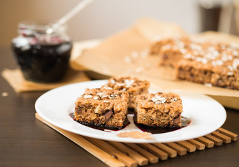 Homemade baking. Sweet Dessert. Oatmeal cake with blueberry jam 