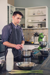 Chef cook working on a modern kitchen at home