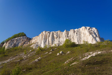 Fototapeta premium Ancient chalk mountains in central Russia. A landscape view of the peaks and hills.