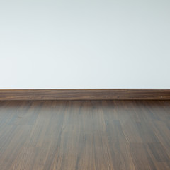 empty room interior, brown wood laminate floor and white mortar wall background