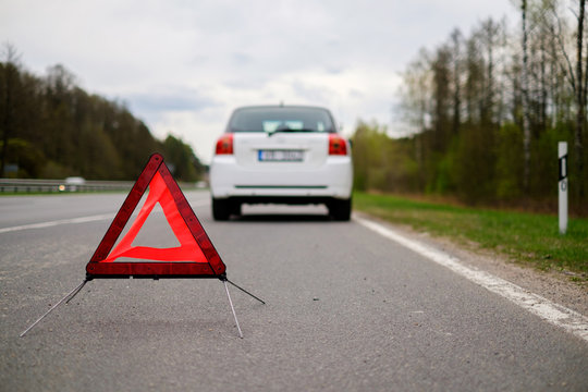 Broken Car On A Road Side