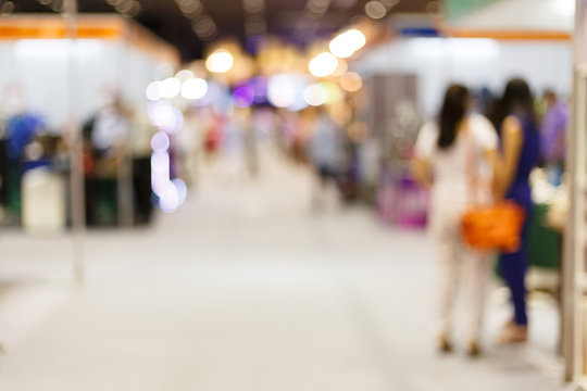 people customer shopping in hall exhibition trade fair, image blur used background