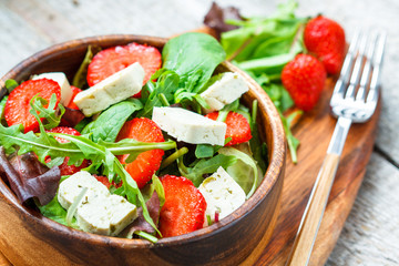 Vegan salad with tofu and strawberries. Love for a healthy vegan food concept