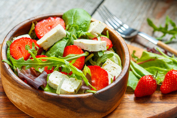 Vegan salad with tofu and strawberries. Love for a healthy vegan food concept