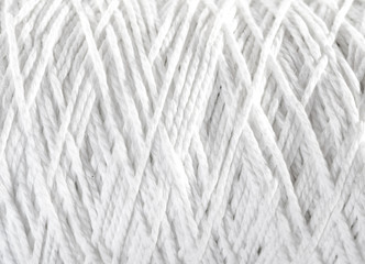 Roll of white rope isolated on white background