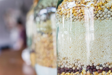 Decorative glass jar with grains
