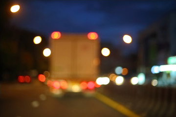 night light of truck car on the city street, abstract blur bokeh background