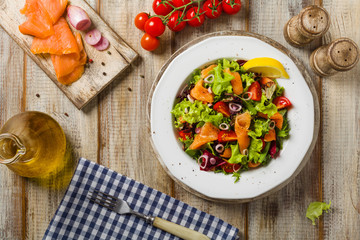 Fresh salad with smoked salmon.