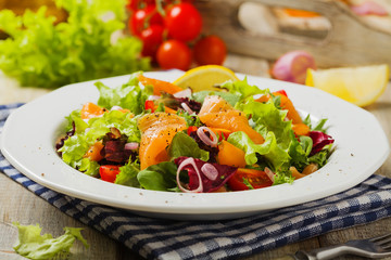 Fresh salad with smoked salmon.