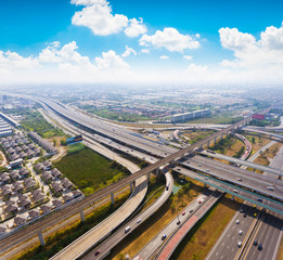 Aerial highway junction. Busy highway from aerial view.  Urban highway and lifestyle concept. Highway taken in the eastern highway of Bangkok Thailand.