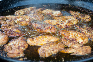 Meat Slices Deep Fried in Hot Oil