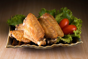 fried chicken on a wooden table