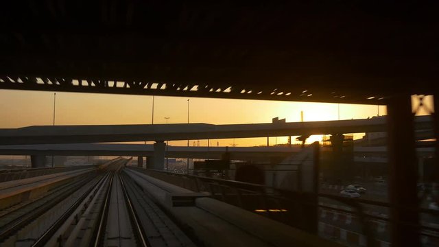 dubai sunset time famous metro ride traffic front panorama 4k uae
