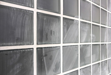 Wall of glass dirty blocks