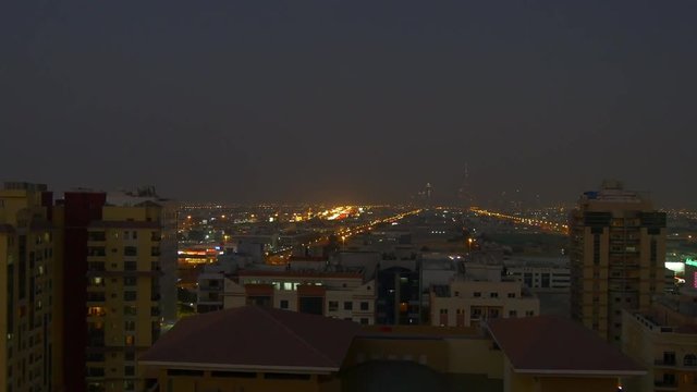 night time al barsha downtown cityscape rooftop panorama 4k uae
