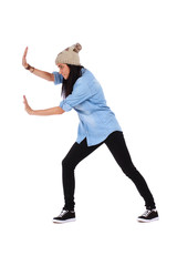 Woman pushing something imaginary over white