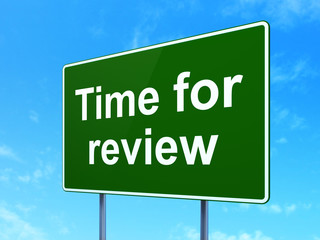 Time concept: Time for Review on road sign background