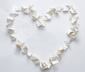 torn crumpled paper heart shape