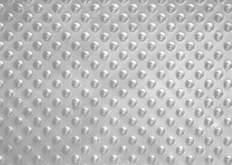 Abstract background of silver drops on a silver metal plate,