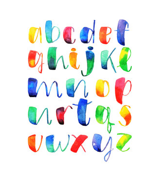 Hand drawn alphabet written with brush pen in bright colors. Cursive letters. Watercolor alphabet very fresh and modern style lettering.