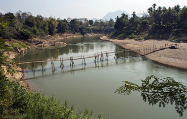 Fototapeta premium bamboo bridge over mekong