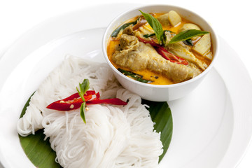 Thai vermicelli served with thai hot and spicy chicken wings curry