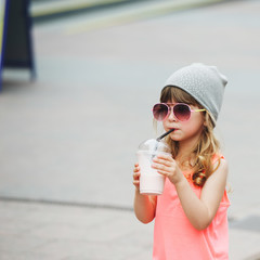 cute little girl with milk cocktail