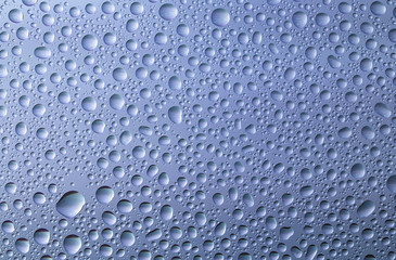 Closeup of water drops on glass surface