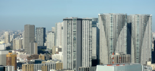 日本・東京の都市風景（勝どきや晴海方向などのビルやマンション群を望む）都市生活のイメージ