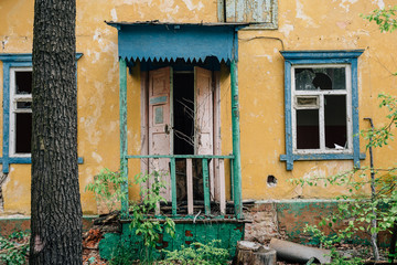 Facade of abandoned house, demolished ruined house