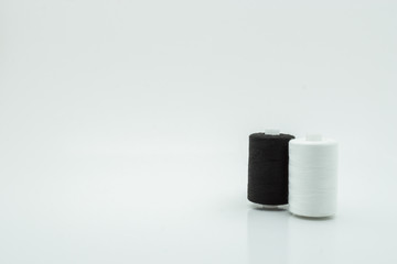 Threads over white background