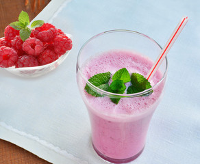 Healthy raspberry smoothie liquid food with Greek yogurt in glass