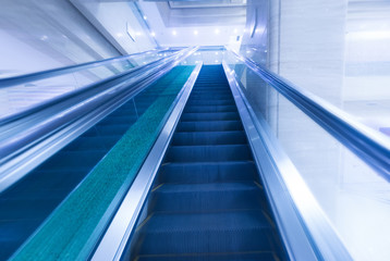 Blurry modern escalator