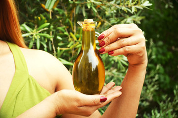 Olive Oil Bottle in hand