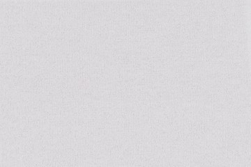 Background of white aged fabric with sparkles