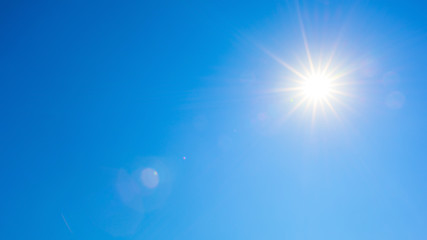 Fototapeta Sommer Hintergrund - blauer Himmel mit Sonne obraz